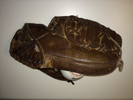The glove that has accompanied Dr. Steve Wolff from Little League play in the early 60s to (watching) the 2015 world champion Royals